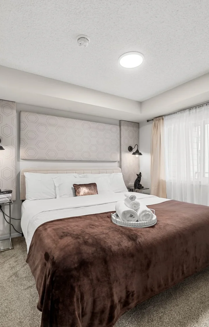 Guest-ready bedroom prepared for a Haytham Stays rental